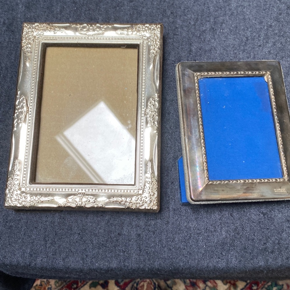 Picture frames. Small one is silver needs polish. It’s vintage.